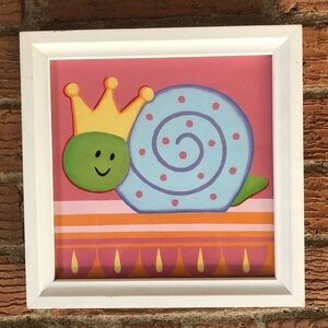 Framed Colorful Art Print of Smiling Snail Wearing a Crown